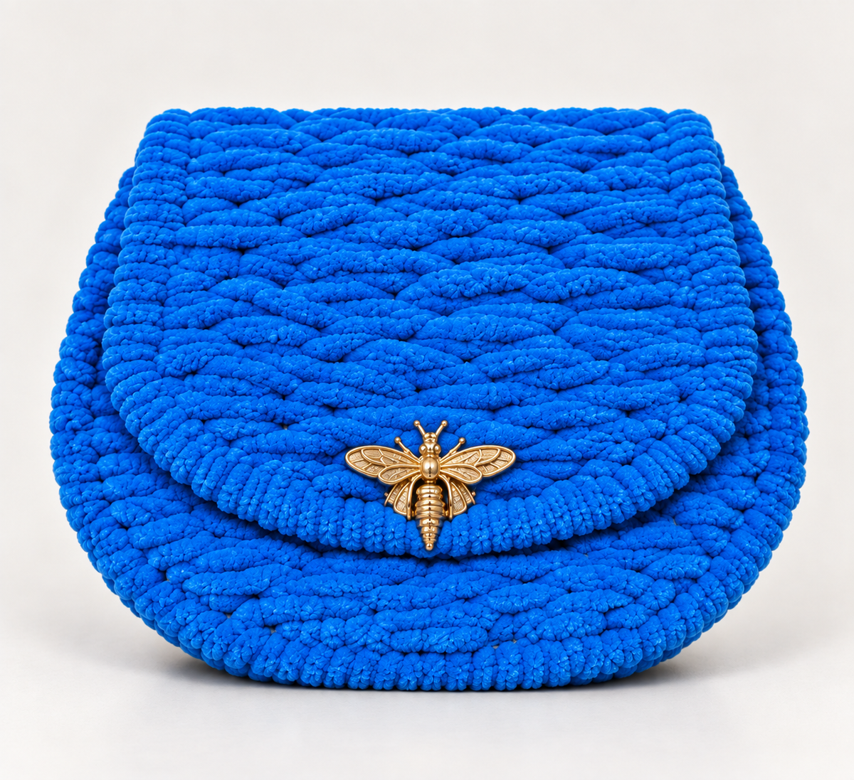 Royal blue chenille clutch bag with gold-tone bee clasp