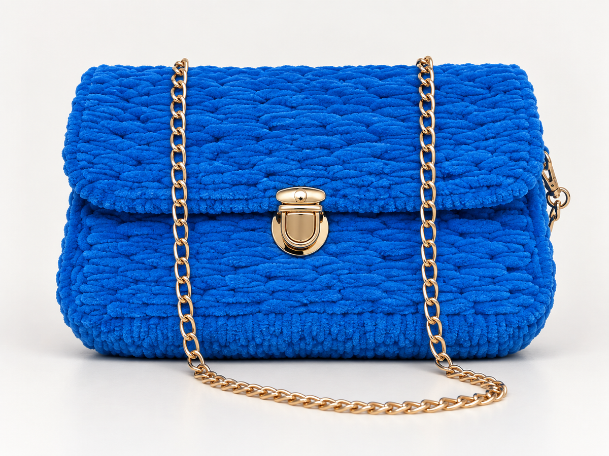 Royal blue chenille shoulder bag with gold chain strap and gold-tone clasp