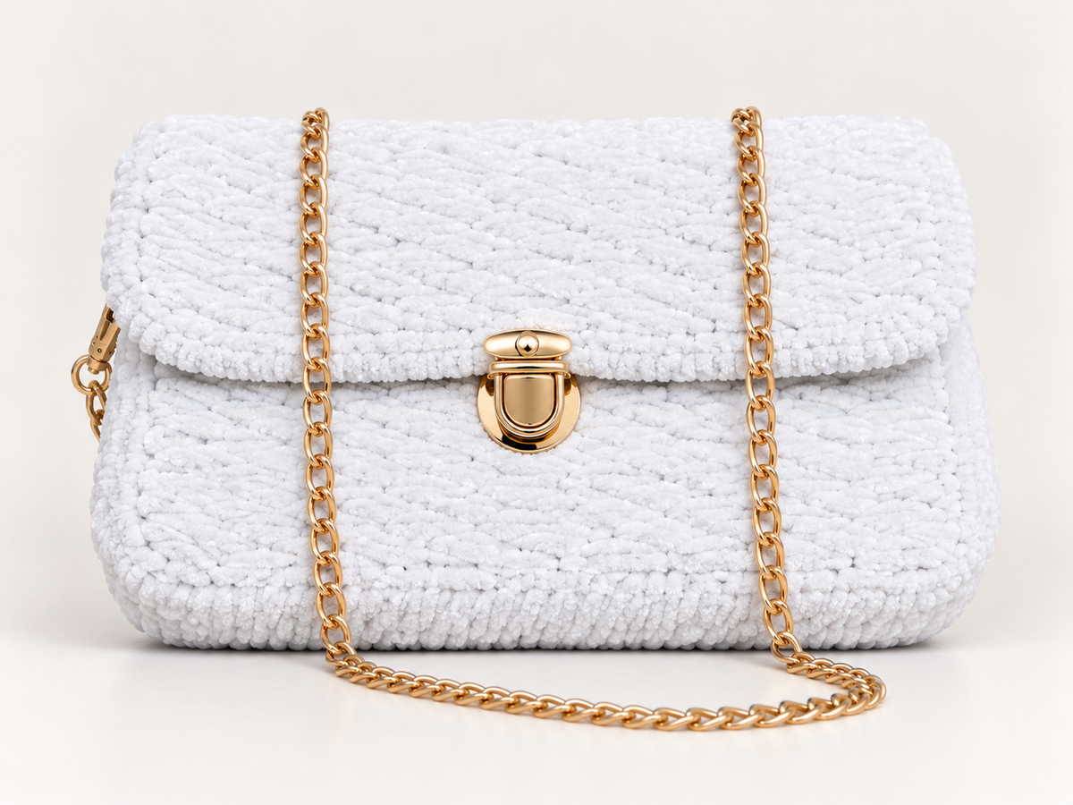 White chenille shoulder bag with gold chain strap and gold-tone clasp